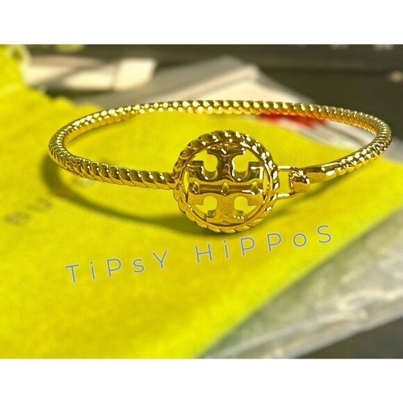 Tory Burch Gold Tone Logo Bracelet With Textured Band & Iconic Emblem - Picture 1 of 9
